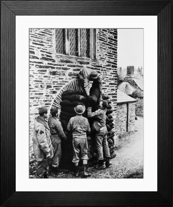 Framed Print : US troops can be seen here in the village Blackawton helping to protect buildings Framed Print : US troops can be seen here in the village Blackawton helping to protect buildings