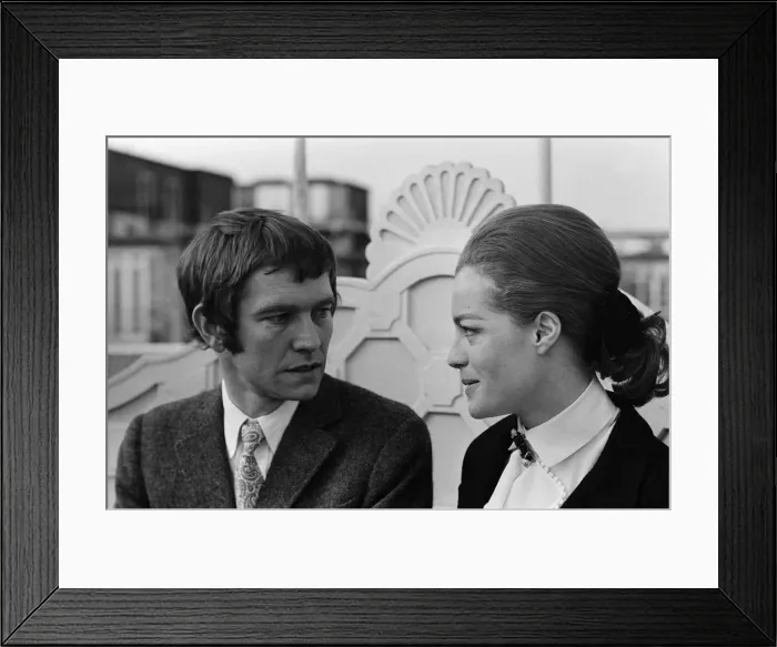 Framed Print : Tom Courtenay and Romy Schneider at the Dorchester Hotel looking at some of the places