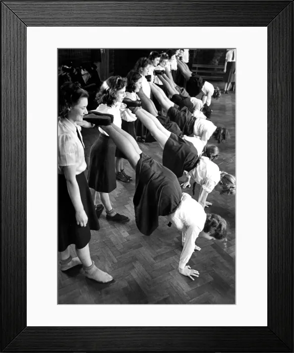 Framed Print : Schoolgirls - Physical Training Exercise Keepfit March 1942 Framed Print : Schoolgirls - Physical Training Exercise Keepfit March 1942