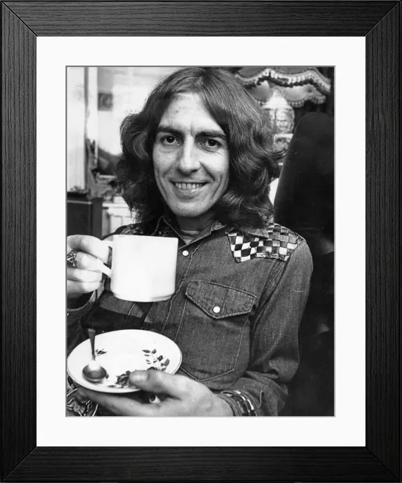Framed Print : George Harrison, once a member of The Beatles, pictured having a cup of tea in Warrington Framed Print : George Harrison, once a member of The Beatles, pictured having a cup of tea in Warrington