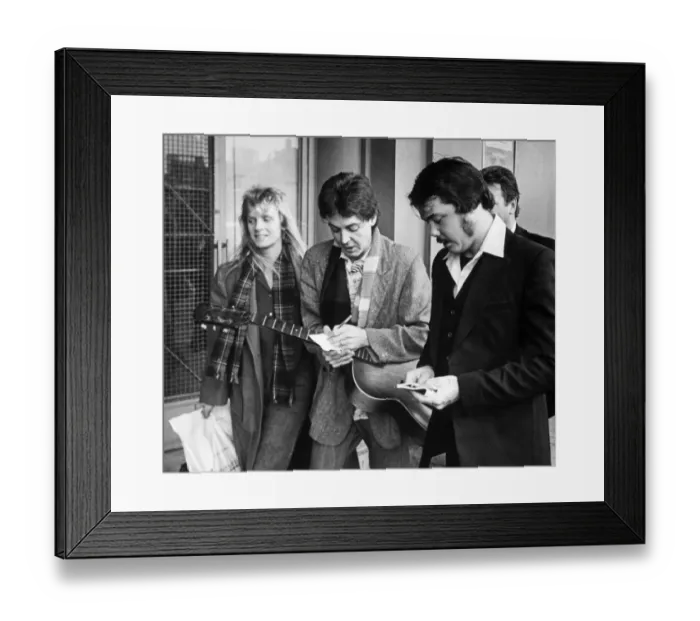 Framed Print : Paul McCartney pictured signing an autograph at The Royal Court Theatre in Liverpool