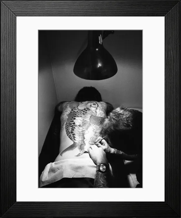 Framed Print : Scenes inside a tattoo parlour. 28th May 1981