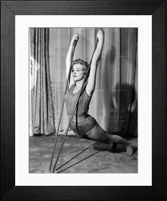 Framed Print : Woman exercising September 1956 Framed Print : Woman exercising September 1956