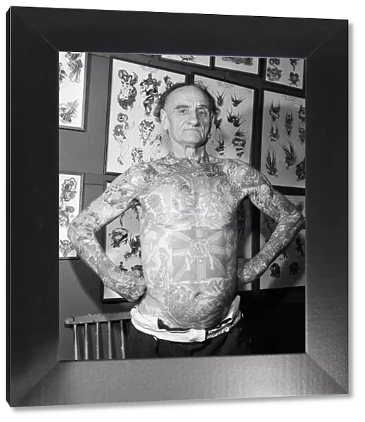 72-year-old Wilf Hardy whos body is covered in tattoos. 8th December 1979