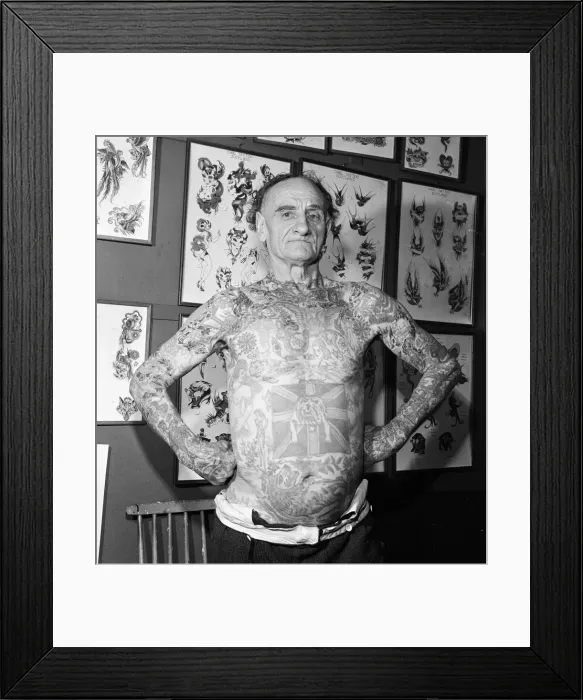 Framed Print : 72-year-old Wilf Hardy whos body is covered in tattoos. 8th December 1979