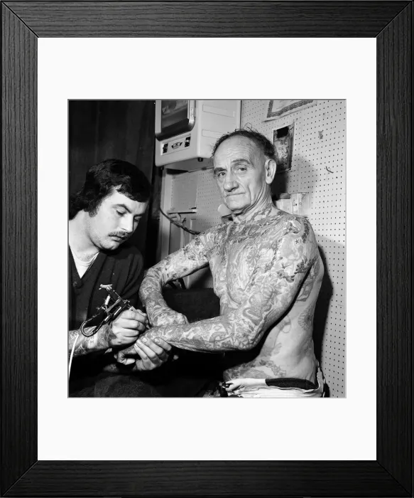 Framed Print : 72-year-old Wilf Hardy whos body is covered in tattoos Framed Print : 72-year-old Wilf Hardy whos body is covered in tattoos