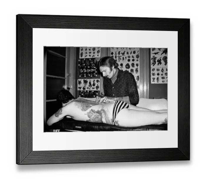 Framed Print : Tattooist George Bone at work. March 1977