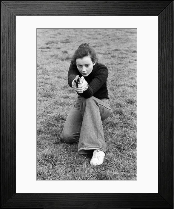 Framed Print : Chief Instructor, Sergeant Ivor Montgomery, training police women on the firing range Framed Print : Chief Instructor, Sergeant Ivor Montgomery, training police women on the firing range