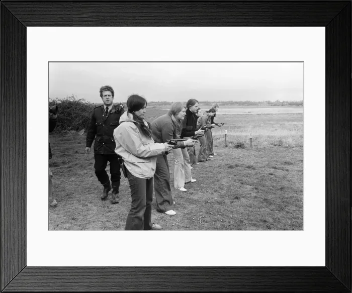 Framed Print : Chief Instructor, Sergeant Ivor Montgomery, training police women on the firing range Framed Print : Chief Instructor, Sergeant Ivor Montgomery, training police women on the firing range