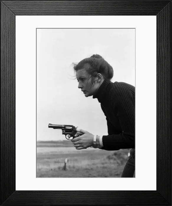 Framed Print : Chief Instructor, Sergeant Ivor Montgomery, training police women on the firing range Framed Print : Chief Instructor, Sergeant Ivor Montgomery, training police women on the firing range