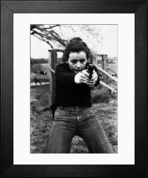 Framed Print : Chief Instructor, Sergeant Ivor Montgomery, training police women on the firing range Framed Print : Chief Instructor, Sergeant Ivor Montgomery, training police women on the firing range