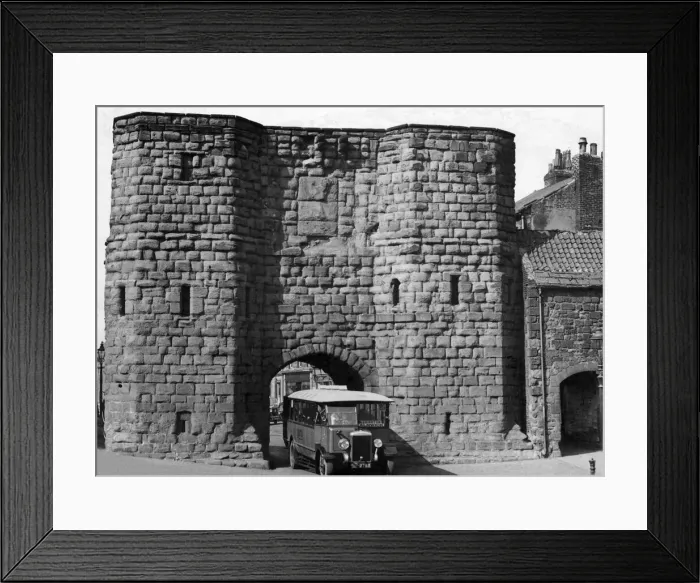 Framed Print : A bit of ancient Alnwick, this great stone gateway guards the main road into the town Framed Print : A bit of ancient Alnwick, this great stone gateway guards the main road into the town