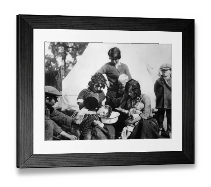 Framed Print : Curing earache in gipsy fashion. It is their belief that water poured from a kettle into