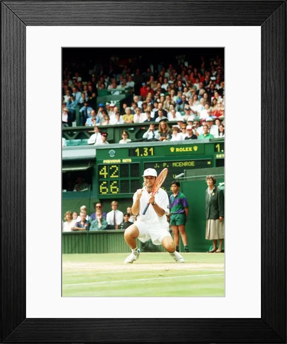 Framed Print : Andre Agassi plays John McEnroe in the Mens Singles Semi-Final Wimbledon 1992 Framed Print : Andre Agassi plays John McEnroe in the Mens Singles Semi-Final Wimbledon 1992