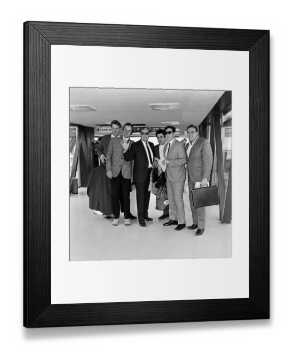 Framed Print : Bill Haley arrives at London Airport. Leather clad rockers from his fans club were