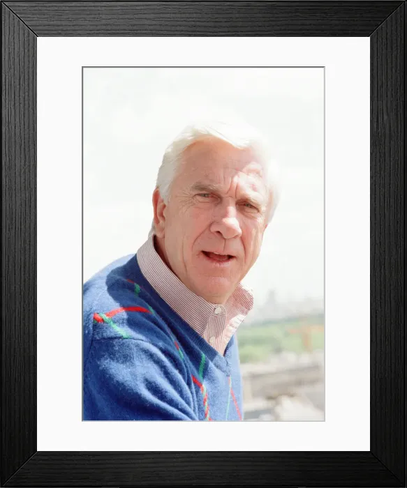 Framed Print : Leslie Nielsen, Canadian actor and comedian, pictured Thursday 24th May 1990 Framed Print : Leslie Nielsen, Canadian actor and comedian, pictured Thursday 24th May 1990