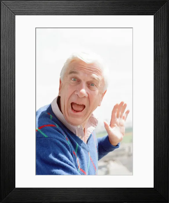 Framed Print : Leslie Nielsen, Canadian actor and comedian, pictured Thursday 24th May 1990 Framed Print : Leslie Nielsen, Canadian actor and comedian, pictured Thursday 24th May 1990