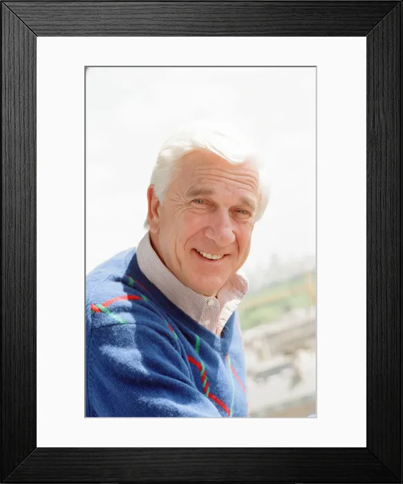 Framed Print : Leslie Nielsen, Canadian actor and comedian, pictured Thursday 24th May 1990 Framed Print : Leslie Nielsen, Canadian actor and comedian, pictured Thursday 24th May 1990
