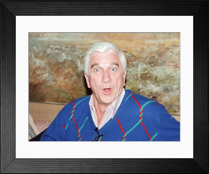 Framed Print : Leslie Nielsen, Canadian actor and comedian, pictured Thursday 24th May 1990 Framed Print : Leslie Nielsen, Canadian actor and comedian, pictured Thursday 24th May 1990