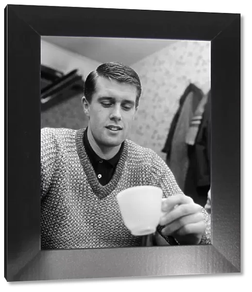 West Ham United footballer Geoff Hurst looks at the tea leaves for a prediction of his