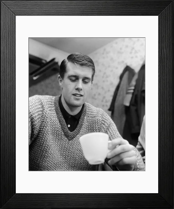 Framed Print : West Ham United footballer Geoff Hurst looks at the tea leaves for a prediction of his