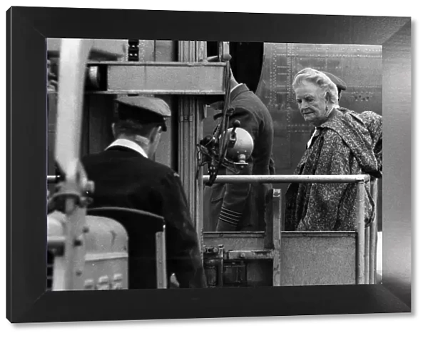 Sir Winston Churchill arrives at London Airport. Lady Churchill photographed aboard