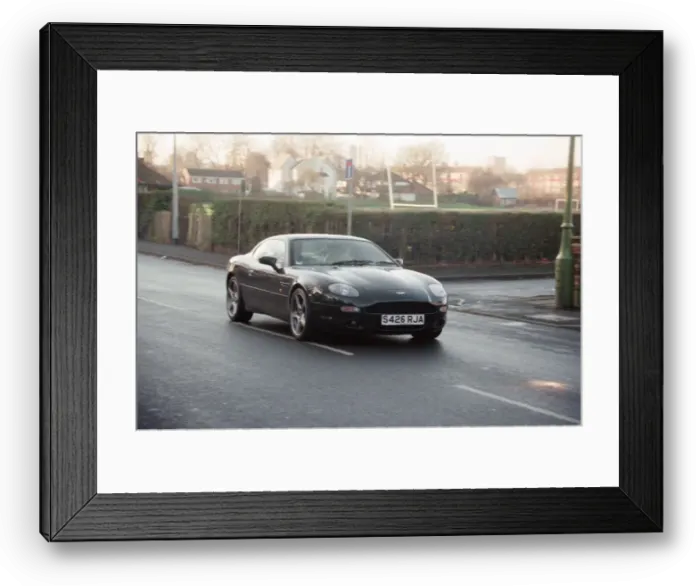 Framed Print : One of the Manchester United players driving their Aston Martin. 1st January 1999 Framed Print : One of the Manchester United players driving their Aston Martin. 1st January 1999