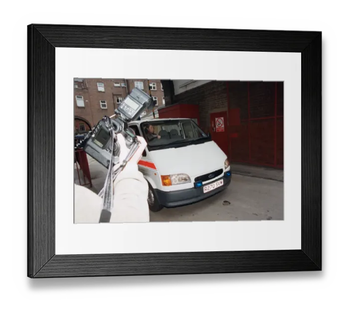 Framed Print : Manchester United captain Roy Keane in police van at Bootle Police station