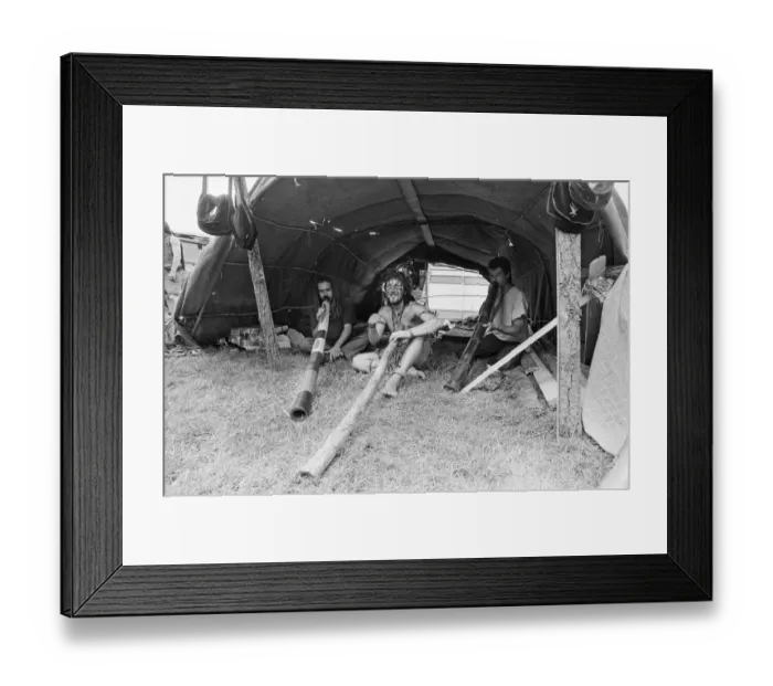 Framed Print : Glastonbury Festival 1994. Festival goers enjoy life with their didgeridoos