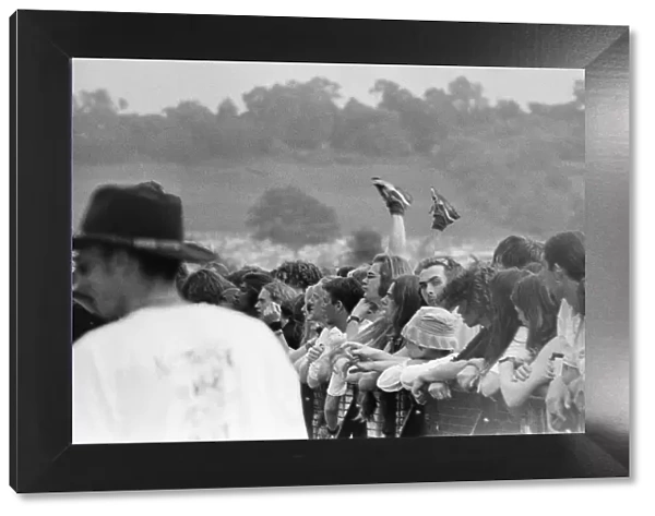 Glastonbury Festival 1994. General scenes of the crowd with a pair of legs