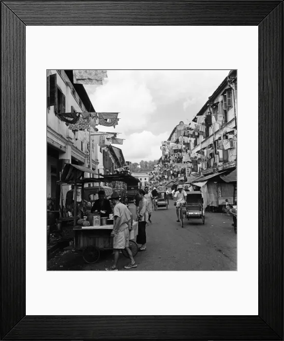 Framed Print : Scenes in Chinatown, Singapore, where old meets new. Clean washing is poked out from Framed Print : Scenes in Chinatown, Singapore, where old meets new. Clean washing is poked out from
