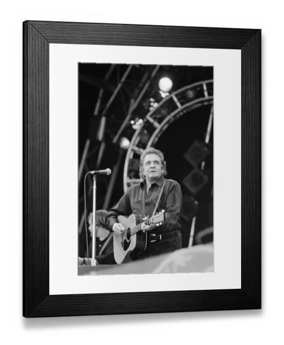 Framed Print : Glastonbury Festival 1994. Pictures shows Johnny Cash performing on The Pyramid Framed Print : Glastonbury Festival 1994. Pictures shows Johnny Cash performing on The Pyramid