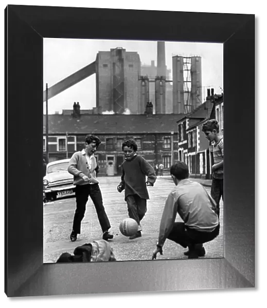 Children playing in Splott, under the shadow of the steelworks. 18th September 1969