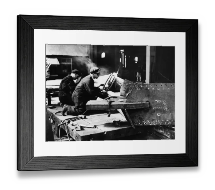 Framed Print : Welders in Tipton Docklands working on a section of fabricated steel sheet frame Framed Print : Welders in Tipton Docklands working on a section of fabricated steel sheet frame