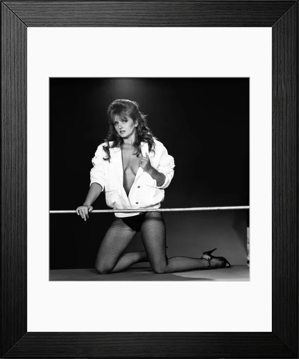 Framed Print : Linda Nolan models a mini dress and bomber jacket marketed under the Naughty