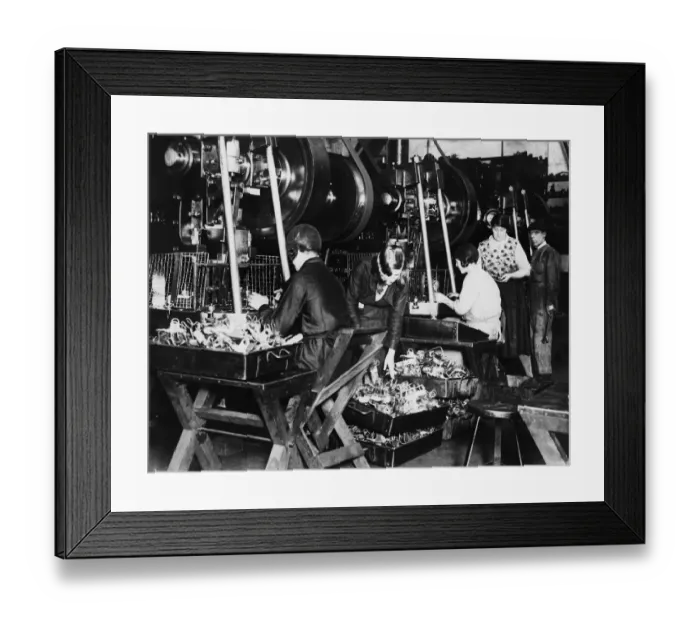 Framed Print : The stamping workshop in a Birmingham motorcycle factory. Circa 1938
