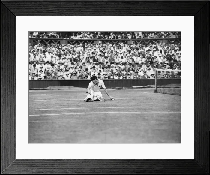 Framed Print : Fred Perry (GB) on the floor during his 1934 mens semi final match against Sidney Wood