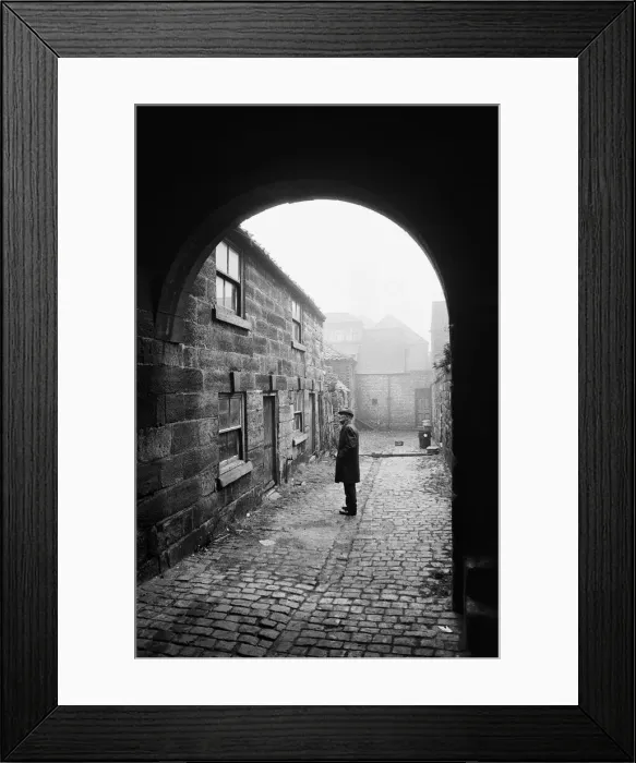Framed Print : A man inspects a 16th century cottage in Guisborough. Redcar, Cleveland. Circa 1975 Framed Print : A man inspects a 16th century cottage in Guisborough. Redcar, Cleveland. Circa 1975