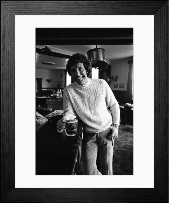 Framed Print : Singer Tom Jones has a quiet drink at his local in Weybridge after missing fans Framed Print : Singer Tom Jones has a quiet drink at his local in Weybridge after missing fans