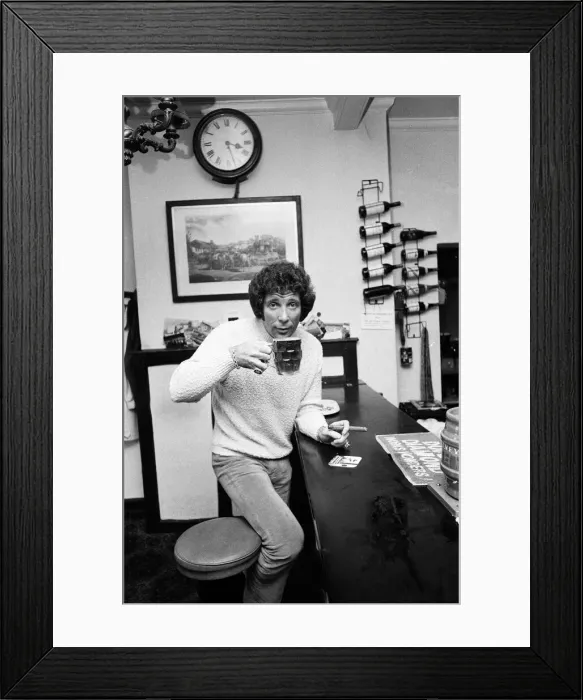 Framed Print : Singer Tom Jones has a quiet drink at his local in Weybridge after missing fans Framed Print : Singer Tom Jones has a quiet drink at his local in Weybridge after missing fans