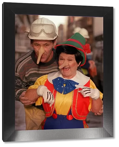 Janette Tough November 1998 as Jimmy Krankie wearing Pinocchio with construction builder