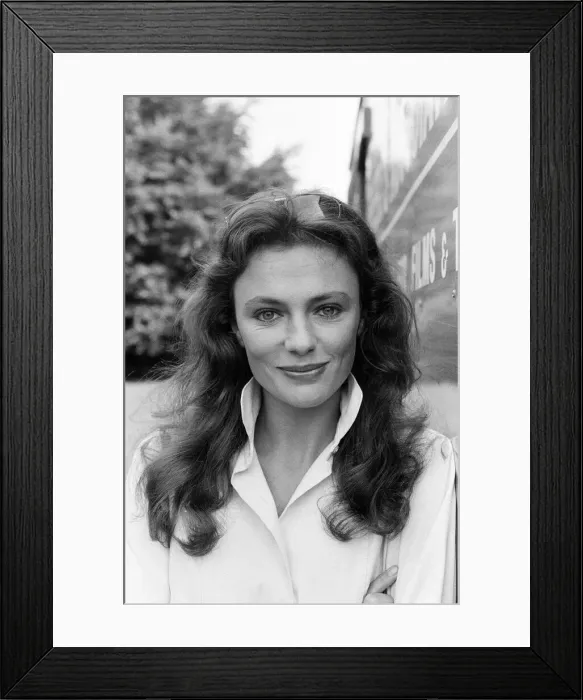 Framed Print : Jacqueline Bisset joined the British trend this summer of running for shelter from Framed Print : Jacqueline Bisset joined the British trend this summer of running for shelter from