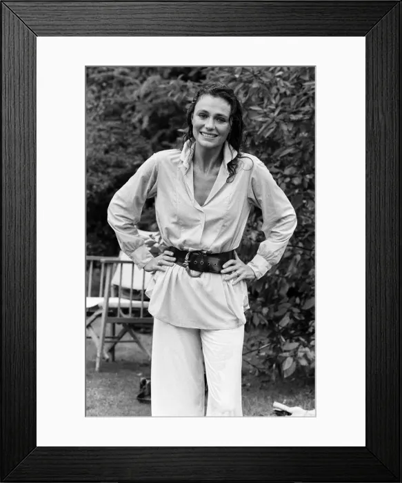 Framed Print : Jacqueline Bisset joined the British trend this summer of running for shelter from Framed Print : Jacqueline Bisset joined the British trend this summer of running for shelter from