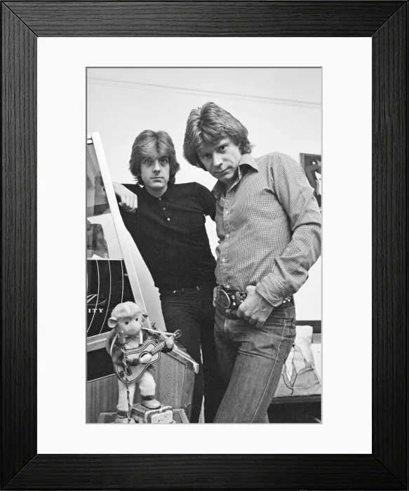 Framed Print : Nick Lowe dark shirt) and Dave Edmunds (in lighter shirt) pictured together in 1979 Framed Print : Nick Lowe dark shirt) and Dave Edmunds (in lighter shirt) pictured together in 1979