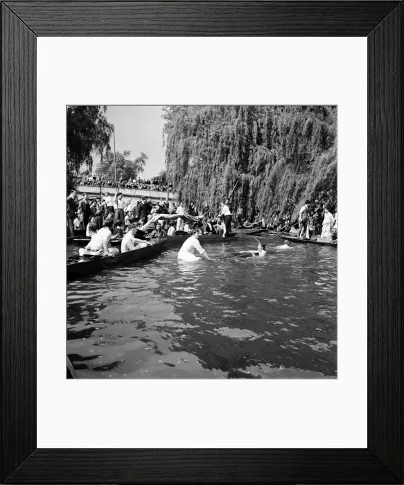 Framed Print : An Oxford and Cambridge boat race with a difference. It is the annual Punt Relay Race