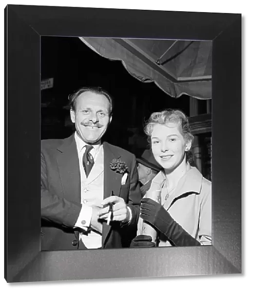 Daily Mirror Debutante, Miss Jill Carter with actor Terry Thomas at the May Fair in