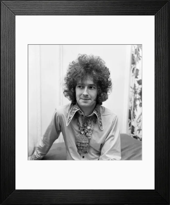 Framed Print : Eric Clapton of Cream shows off his curly hair that is created for him by a West End Framed Print : Eric Clapton of Cream shows off his curly hair that is created for him by a West End