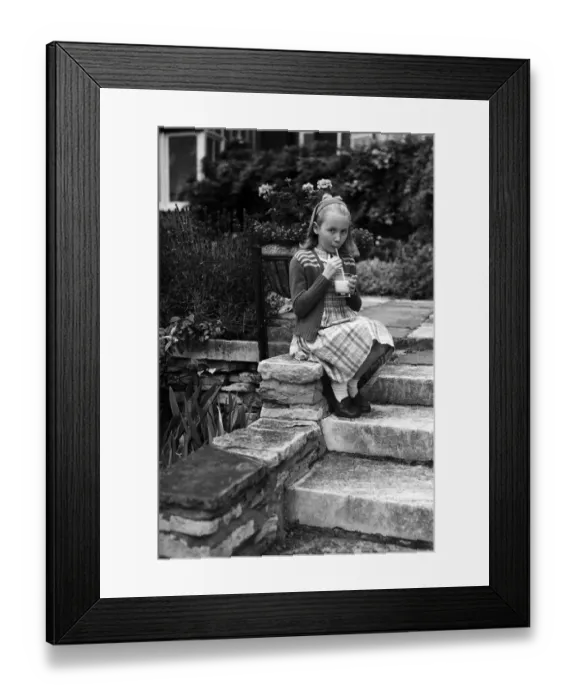 Framed Print : Actress Juliet Mills drinking milk at home. 17th August 1951 Framed Print : Actress Juliet Mills drinking milk at home. 17th August 1951