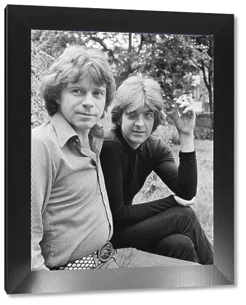 Nick Lowe dark shirt) and Dave Edmunds (in lighter shirt) pictured together in 1979