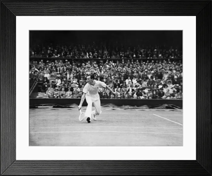 Framed Print : Fred Perry (Right - GB) plays a low back hand at the net against John Van Ryn (Left - USA Framed Print : Fred Perry (Right - GB) plays a low back hand at the net against John Van Ryn (Left - USA
